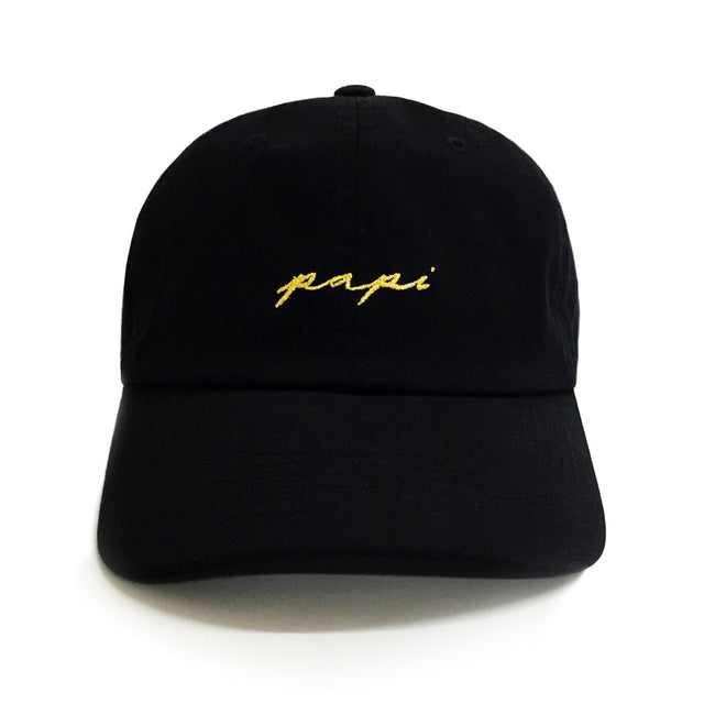 Papi Dad Hat – Black 6-panel cotton embroidered dad hat with gold cursive text. Funny golf hat & best gift for dads.