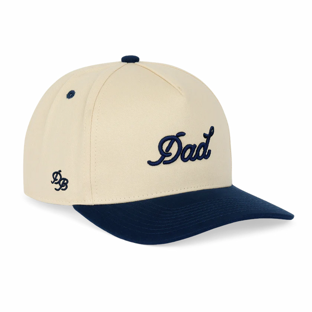 Beige and navy cap with 'Dad' text on a white background

Details